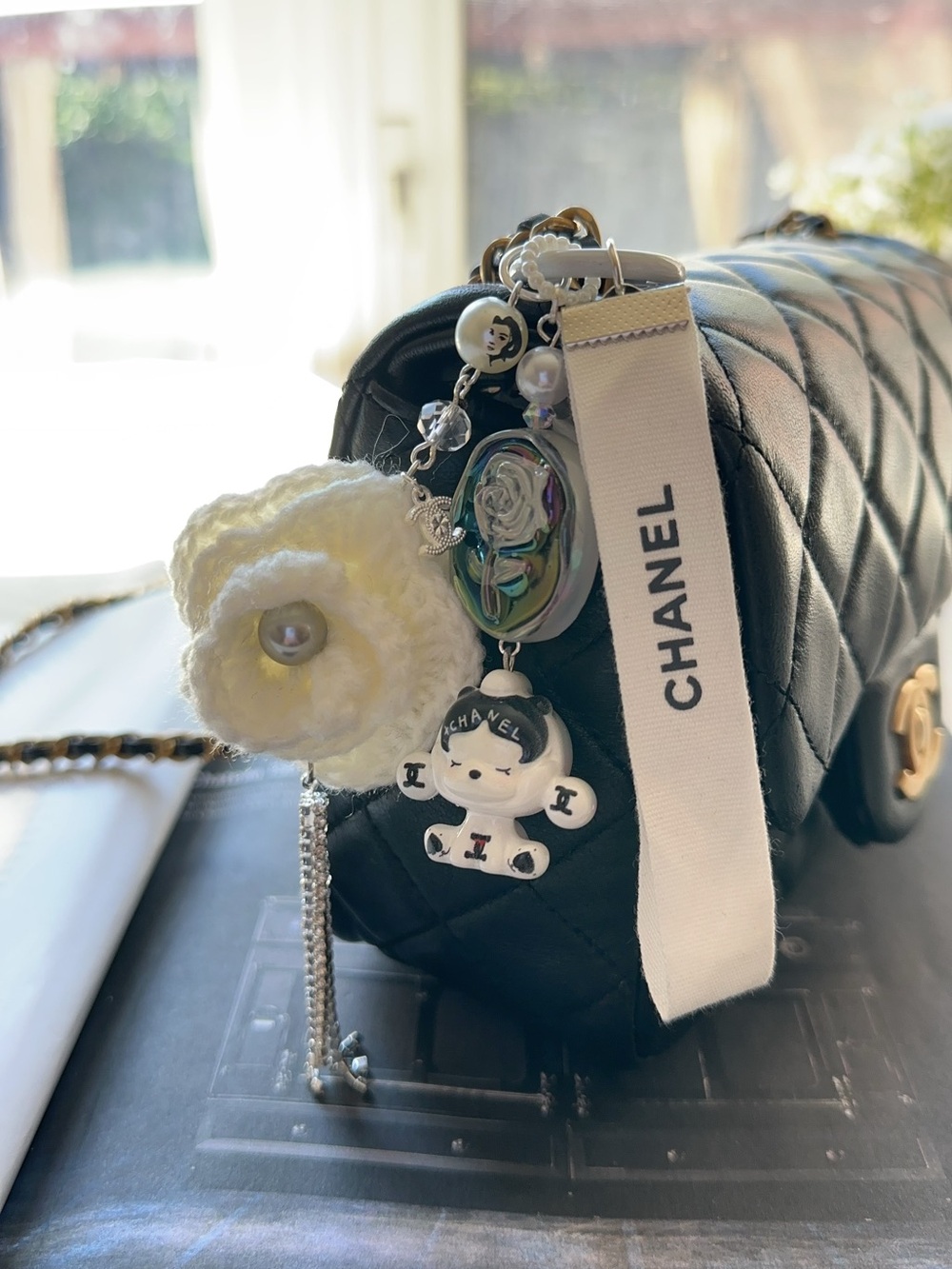 Authentic CC Ribbon with Camellia Tassel & Skullpanda Bag Charm